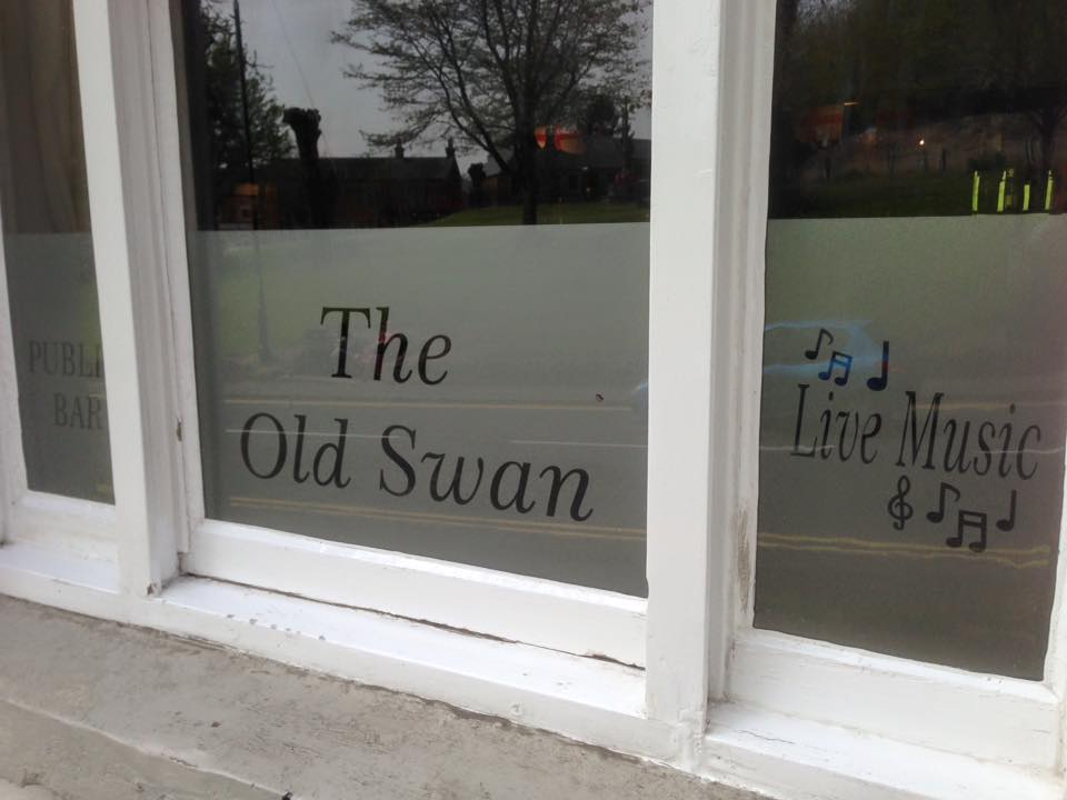 window signs for a local pub.